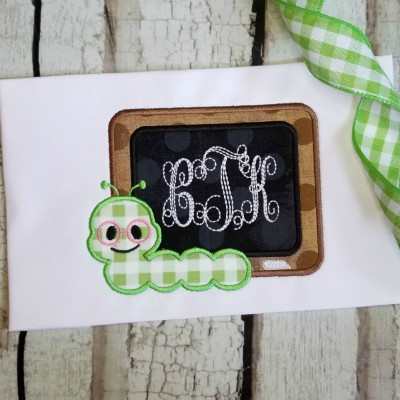 chalkboard with worm applique